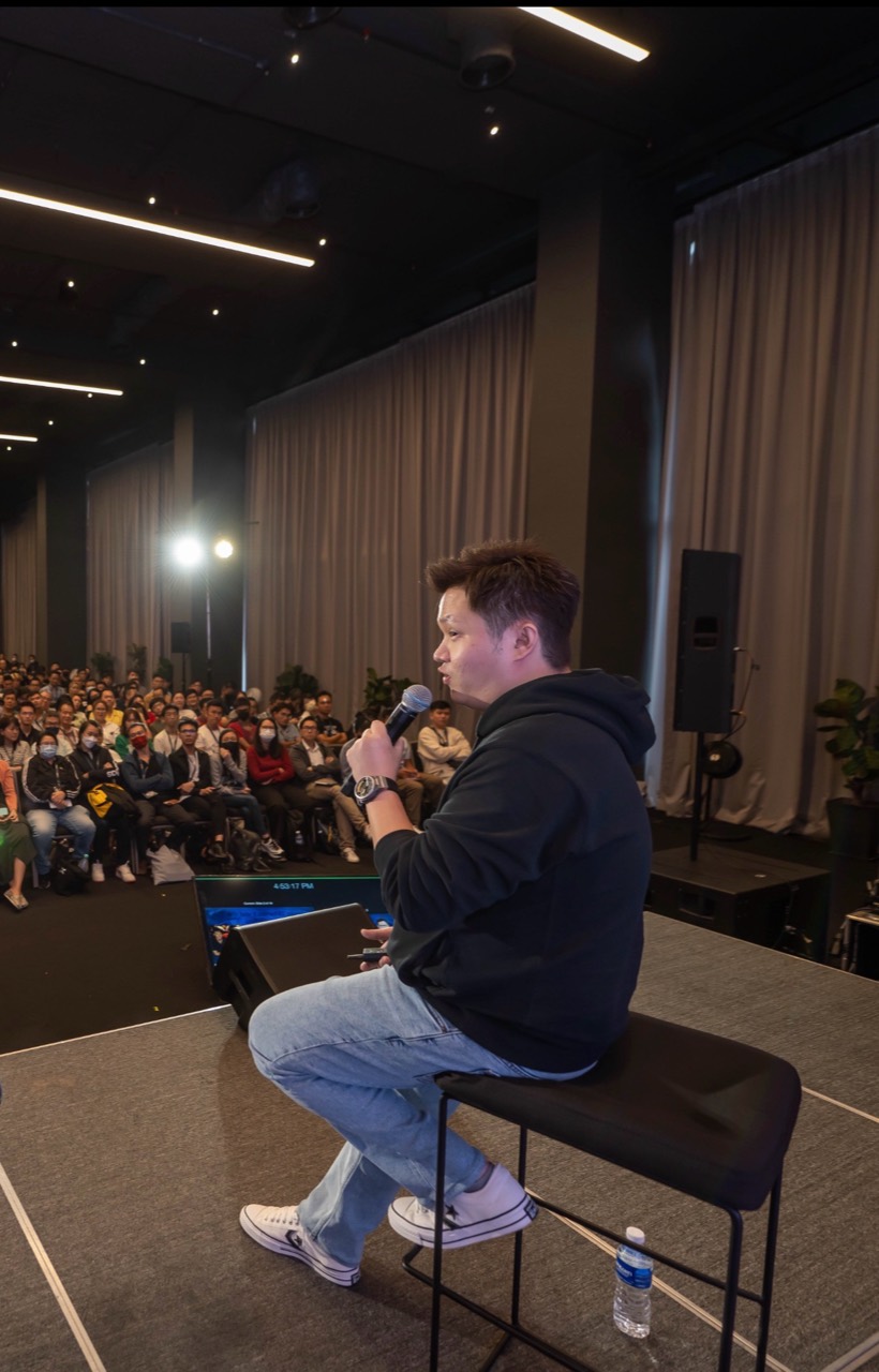 TerraCode founder Lucas Loo speaking to an industry-event audience